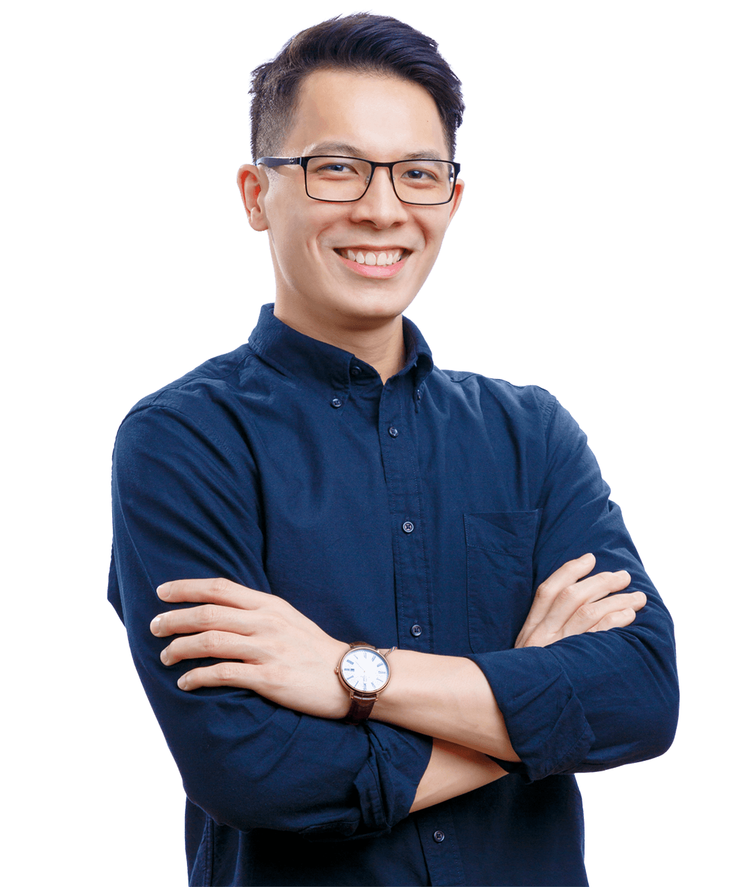 A person wearing glasses and a blue shirt posing at the camera for a corporate portrait.