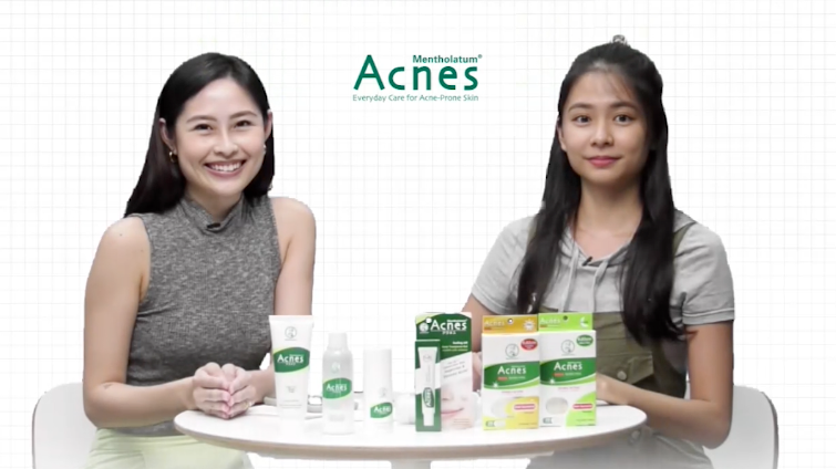 Two presenters sitting at a table with skincare products by Acnes