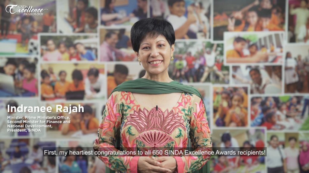 Minister Indranee Rajah looking into the camera while delivering her speech.