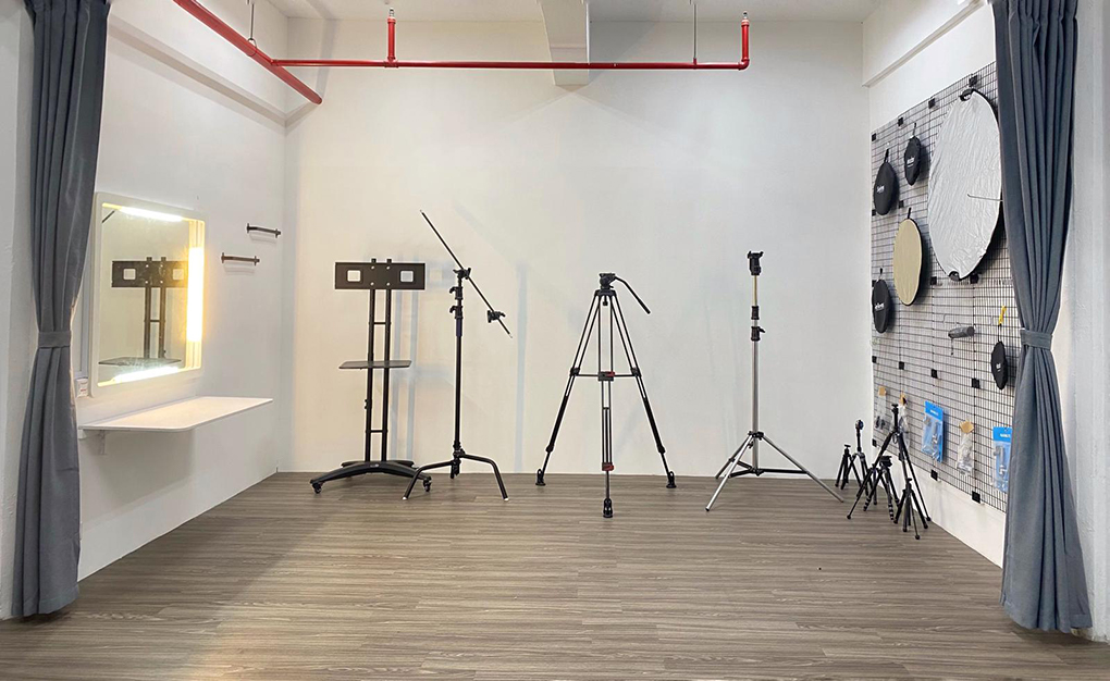 A Studio With Complete Tripod Equipment