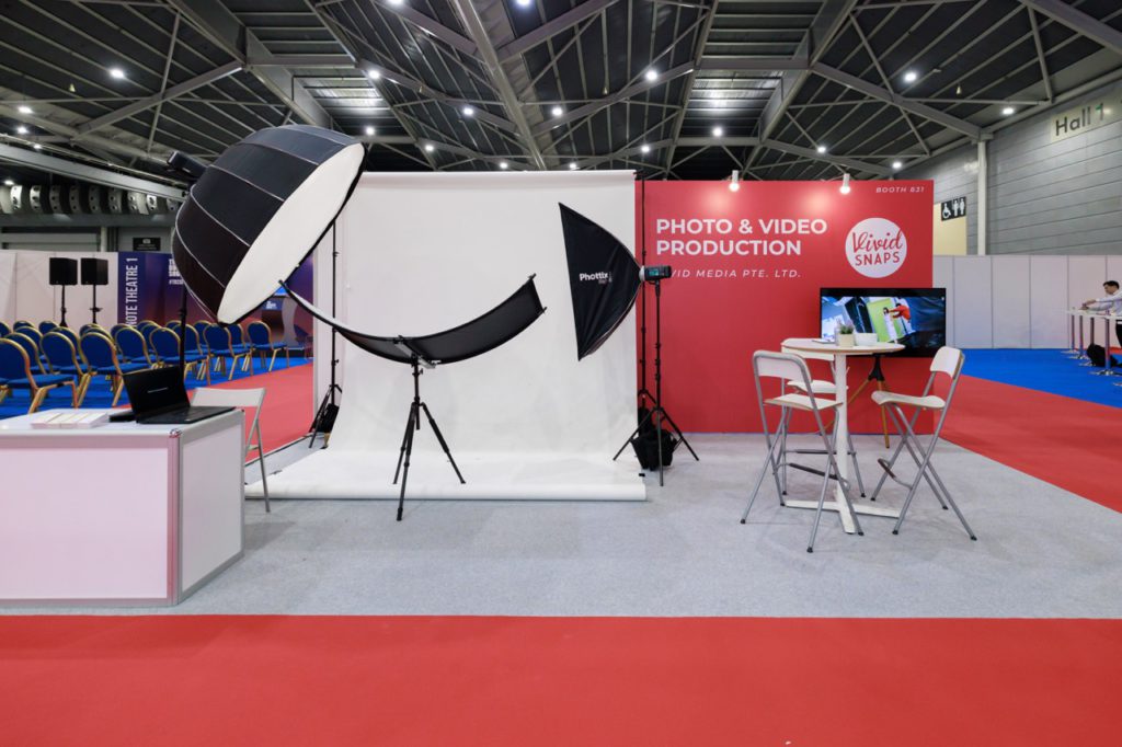 Professional headshot photo booth setup at an exhibition in Singapore