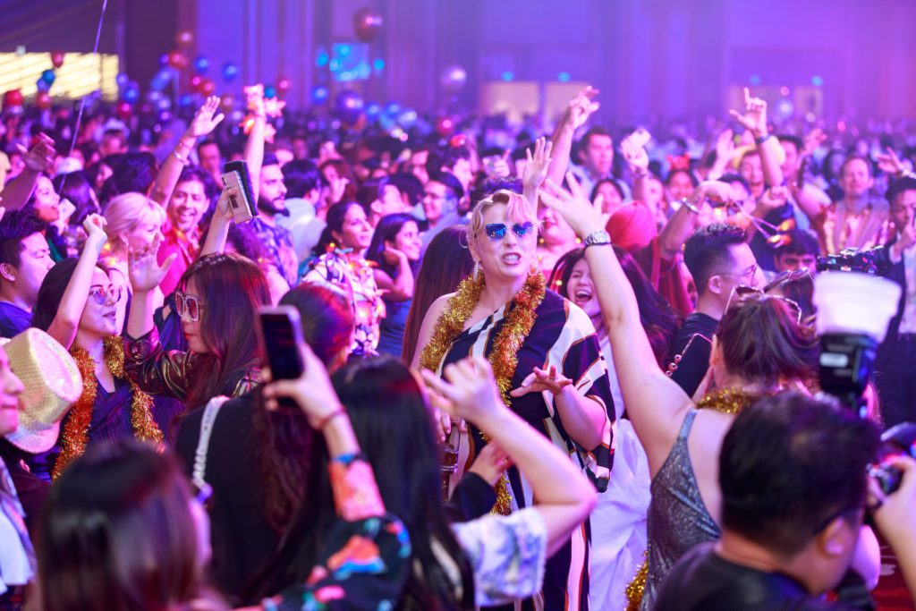 Company Dinner & Dance Nightlife Party Photographer at Marina Bay Sands Grand Ballroom