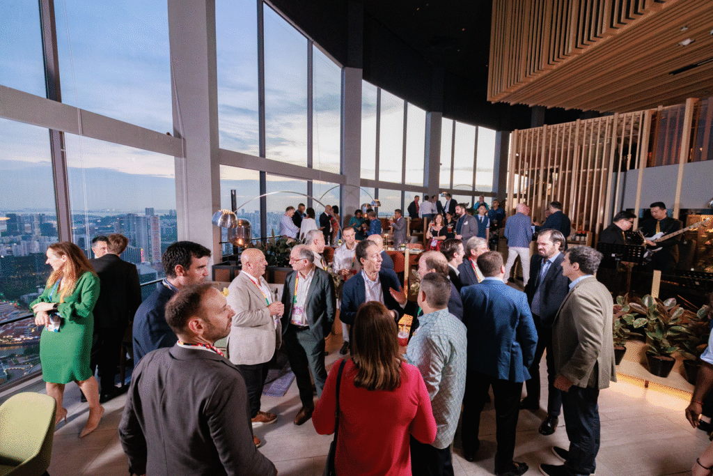 Corporate event photography at a members’ club in Singapore with a formal dining setup
