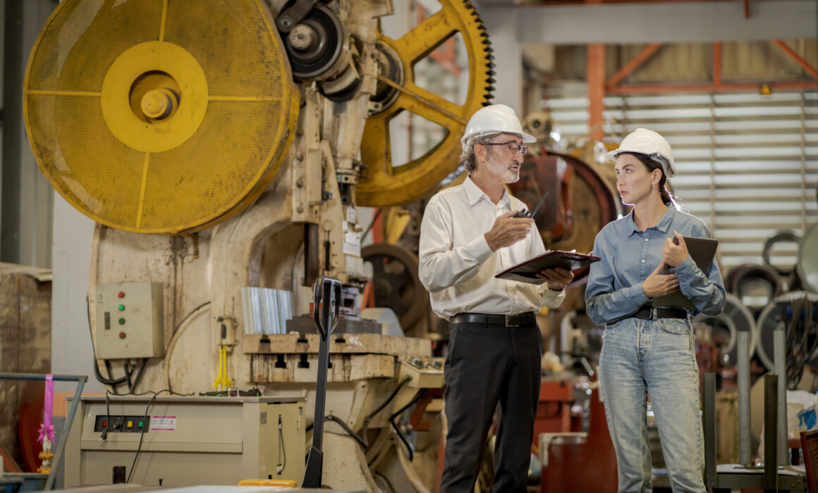 "EHS-managers-discussing-safety-in-workplace-environment"/