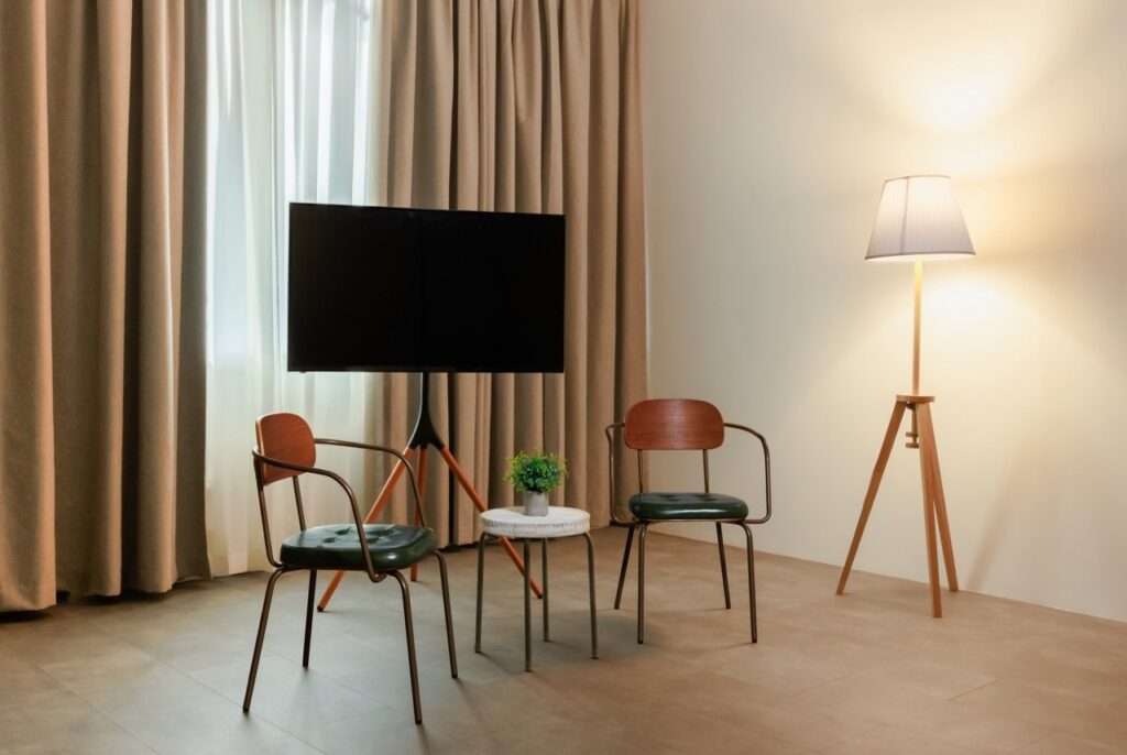 Interview set with soft lights and half-closed curtains in Content Creator Studio Singapore