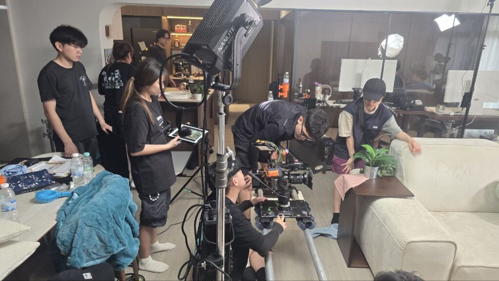 Behind-the-scenes of Vivid Media's production team during a shoot.