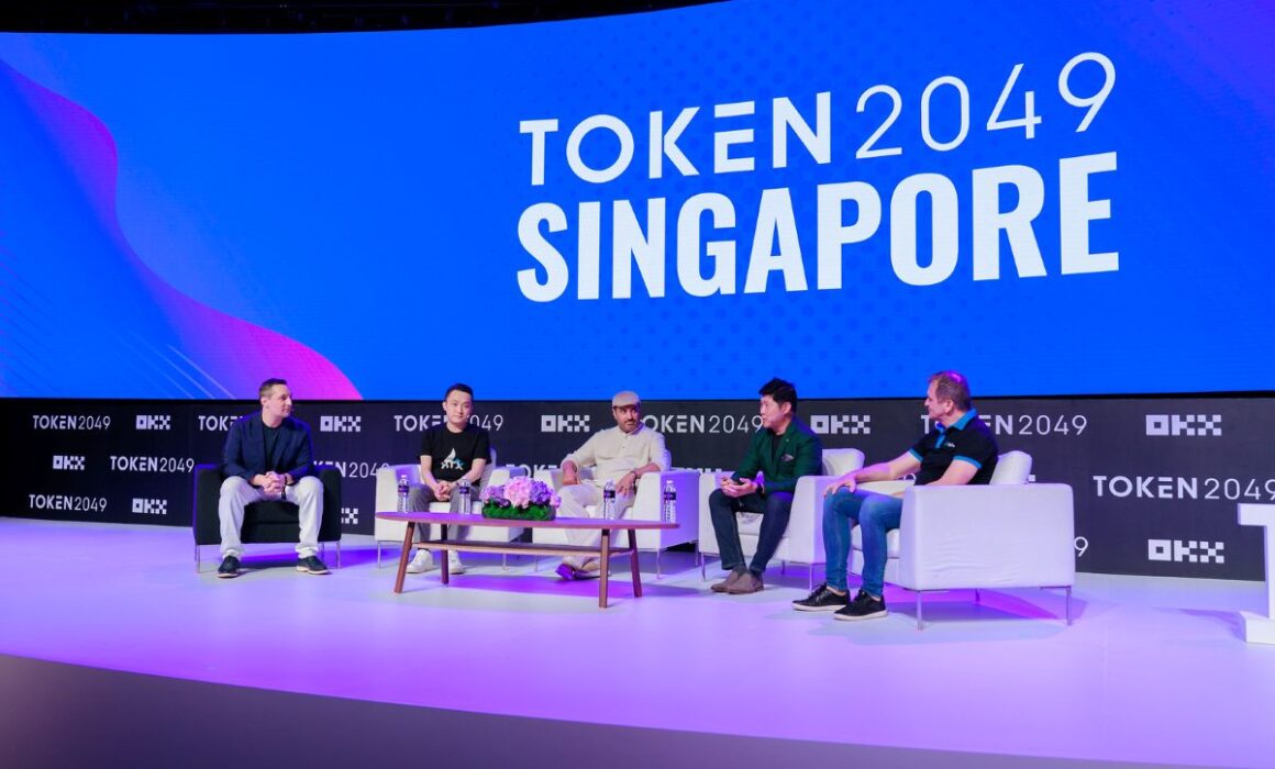 Panel discussion on stage at TOKEN2049, a MICE conference in Singapore.